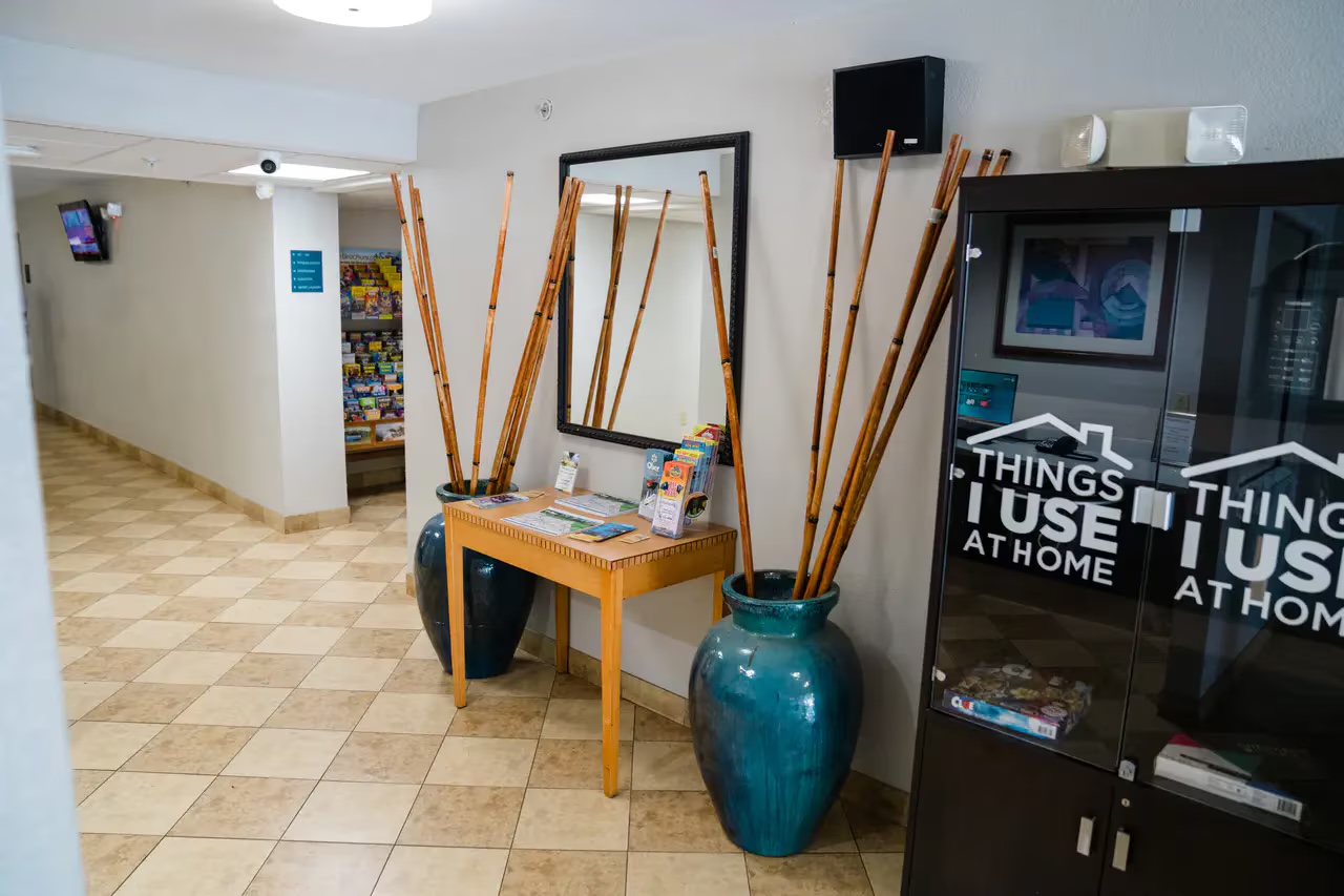 Friendly front desk staff welcoming guests at Mainstay Suites Knoxville